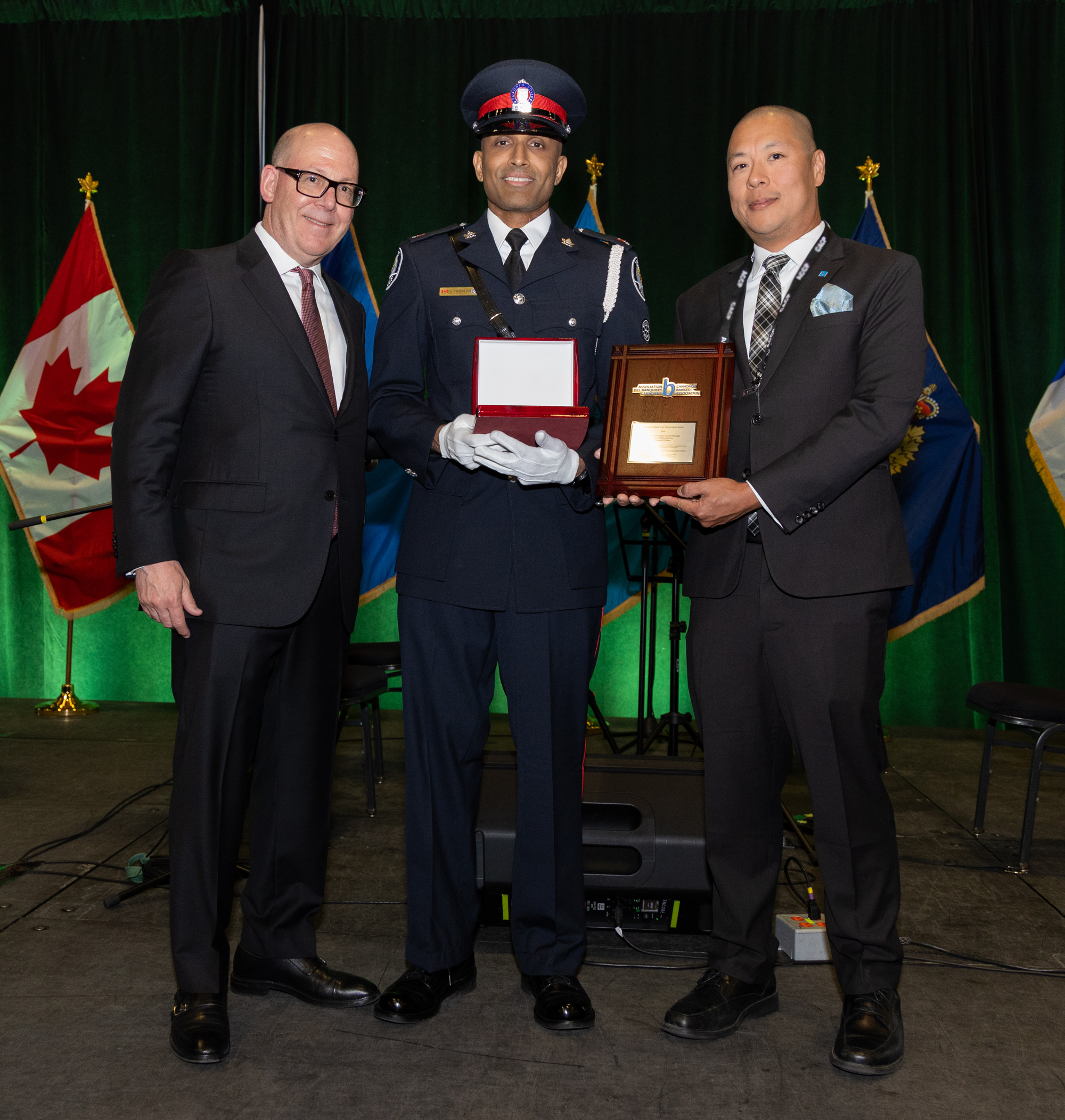 CBA President and CEO Anthony G. Ostler, Detective Constable Sarath Thayalan, Toronto Police Service, CBA Director, Financial Crimes, Ryan Ku